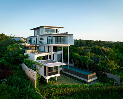 fragmented 'luke house' by budipradono architects stands on dry rock terrain in bali