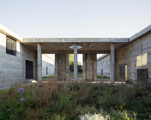 geometric cut-outs puncture pezo von ellrichshausen's fortress-like luna house in chile