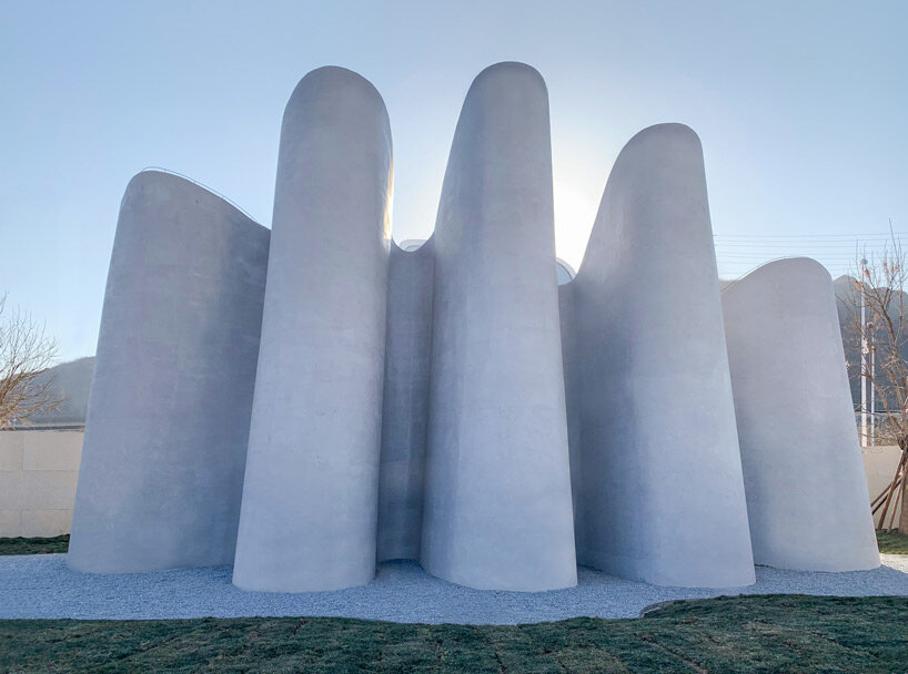 PAO's public restroom meanders around amoeba-shaped concrete structure ...