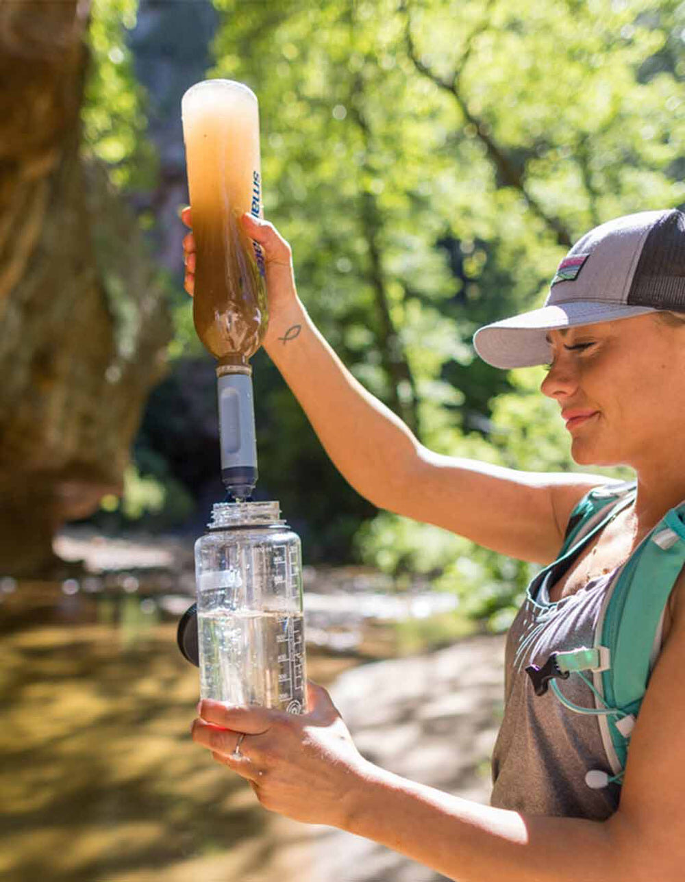 https://www.designboom.com/wp-content/uploads/2023/06/portable-water-filtration-straw-drink-directly-from-lakes-rivers-designboom-d.jpg