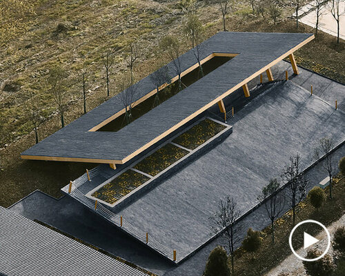 topped with a slanted canopy, this pavilion doubles as a viewing platform in rural china