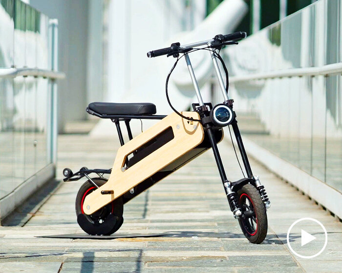 electric scooter 'TOM' folds like a swiss army knife and can charge devices as a powerbank