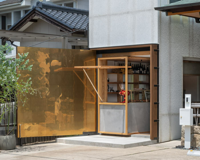 maki yoshimura wedges tiny box-like bakery shop between two houses in japan