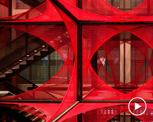 150.000 meters of vibrant red brocade threads compose installation in china