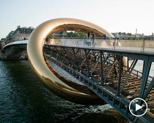 plastique fantastique's ringed installation envelops parisian footbridge for nuit blanche 2023