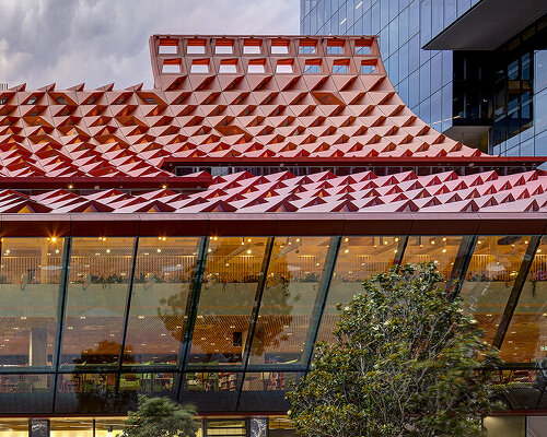 manuelle gautrand's tessellated roof drapes over phive civic center in parramatta, sydney