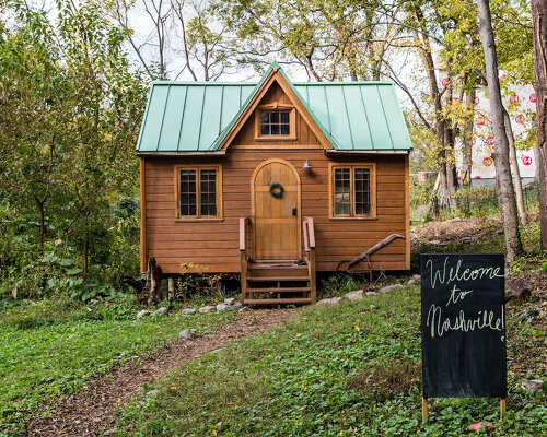 vintage and contemporary features mix within tiny wooden cabin in nashville's woods