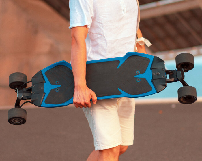 electric skateboard 'traqpod 3' with retractable wheels flips into longboard for land surfing