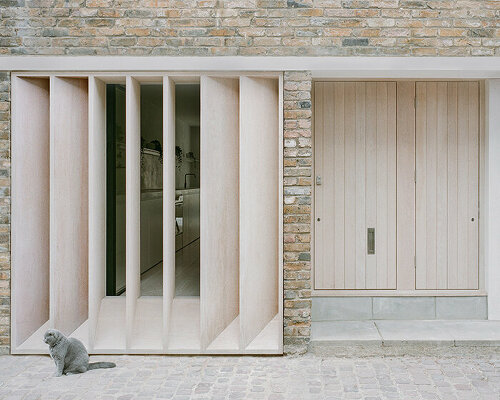 old garage transformed into minimalist family home in primrose hill's cobbled mews