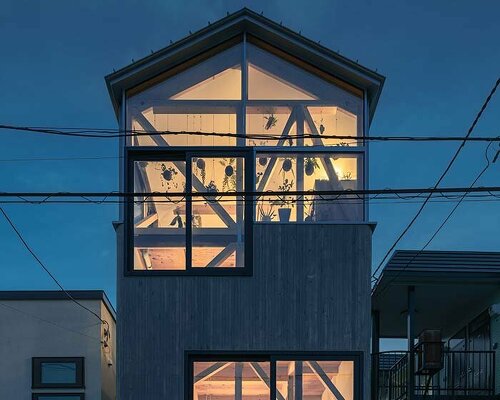 yoshichika takagi tops narrow dwelling in hokkaido with 'greenhouse' kitchen