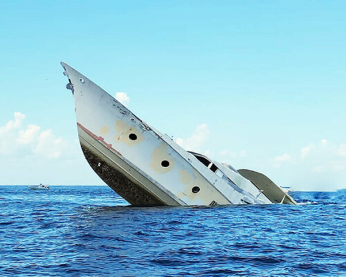 salvaged palmer johnson superyacht built in 1980s sinks into the sea to become artificial reef