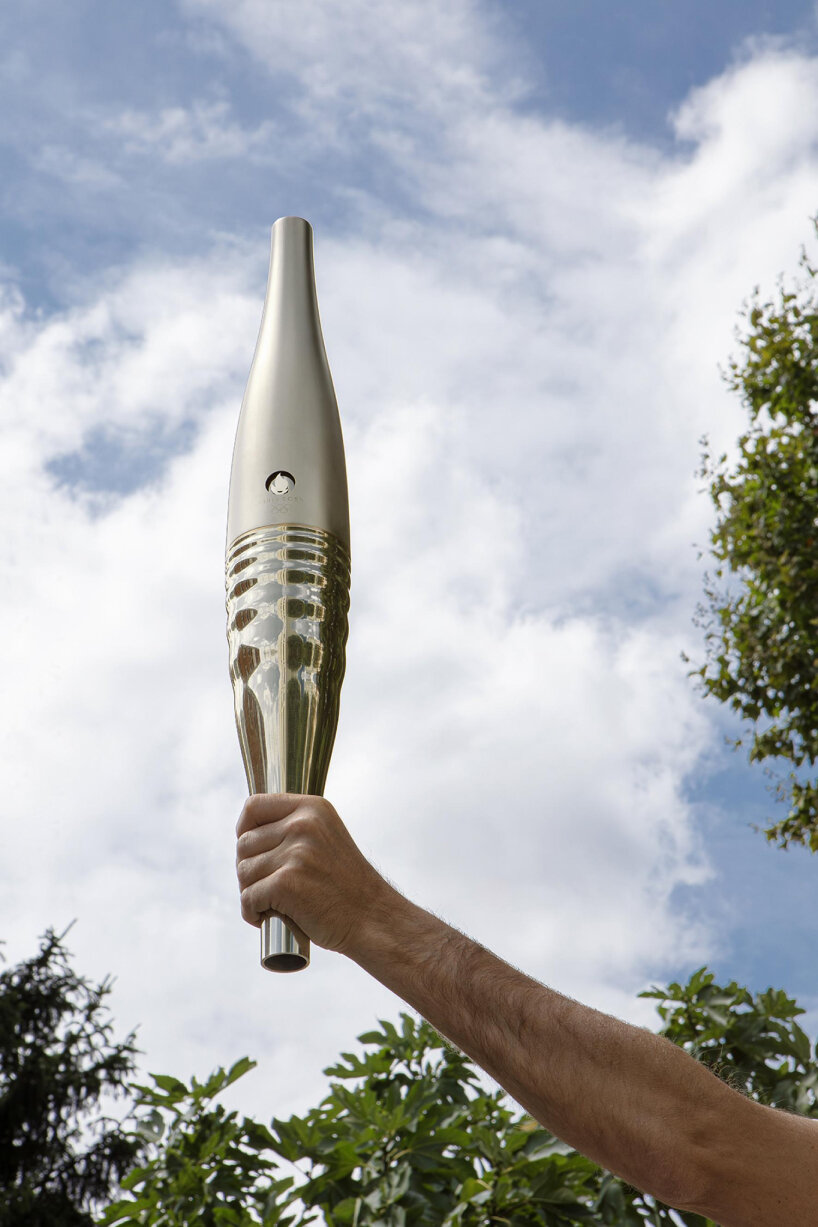 mathieu lehanneur unveils paris 2024 torch as batlike steel that