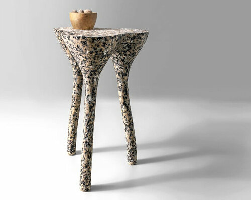 mottled side tables shaped from recycled paper emulate durability and textures of wood