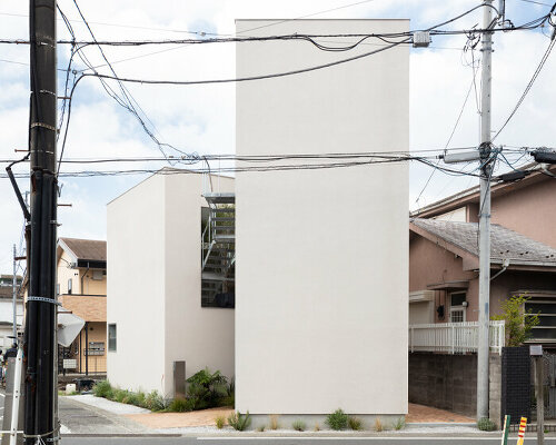 'ONE' house in japan unfolds as rectangular volumes angled north, west & south