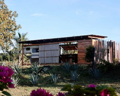 dani serrano encases campervan with teak wood for vacation home in nicaragua