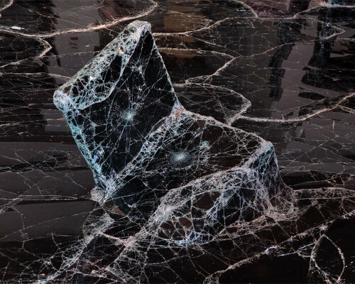 dark tide: baptiste debombourg recreates a magma flow disaster using broken black glass