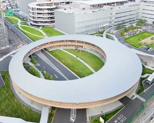 japan's GLP ALFALINK logistics hub unveils sculptural, ring-shaped building for public use