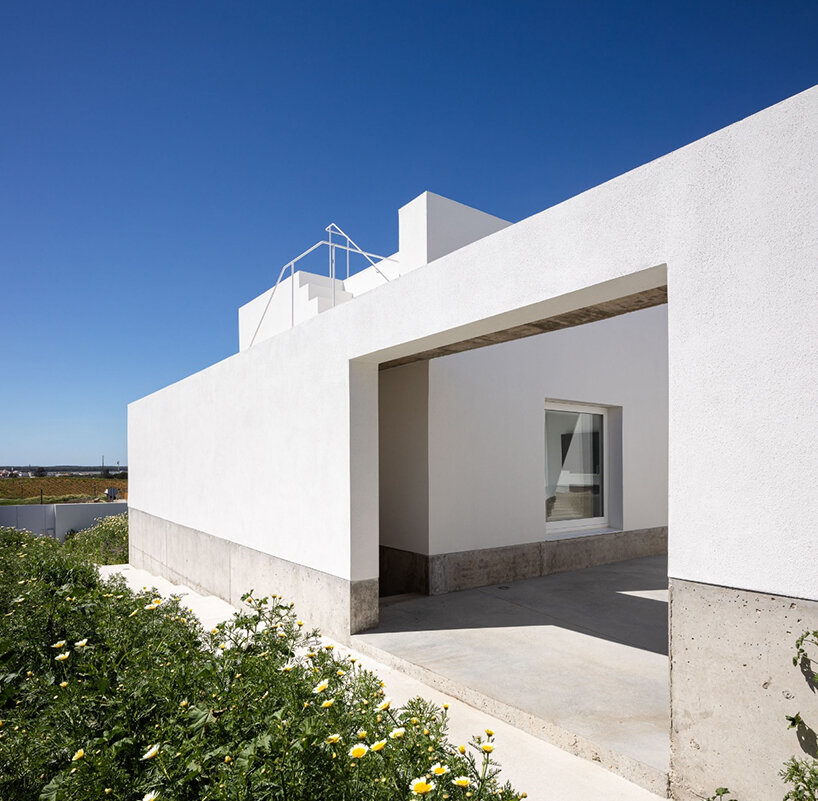 house with two wings by sol89 embraces complex terrain in spain