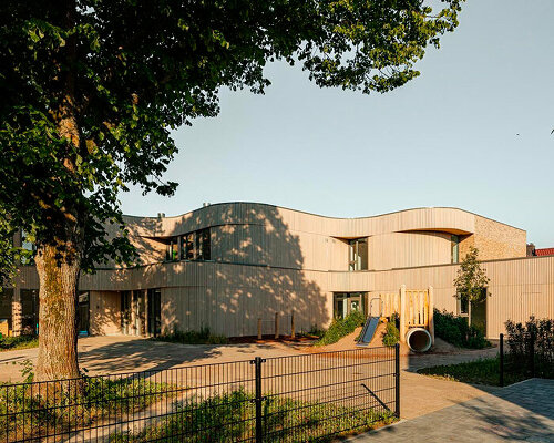 EVA architecten forms flowing curved shapes for primary school in utrecht