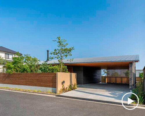 black cedar and stone flooring adorn minimal residence in japan