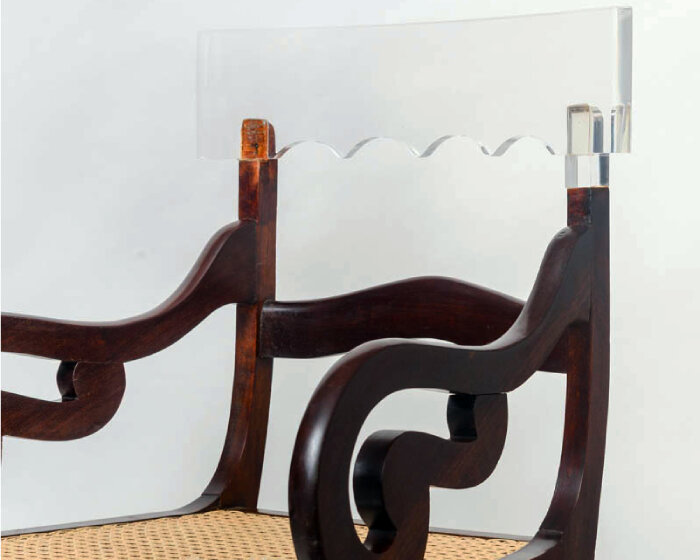 tatiane freitas' sculptures complete missing parts of broken chairs with translucent acrylic