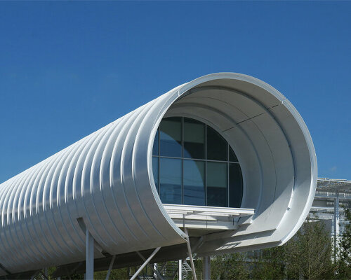 paul clemence captures renzo piano's futuristic & tubular science gateway building at CERN