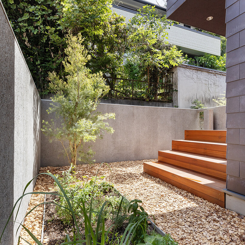 tan yamanouchi's japanese home unfolds around a spiral staircase