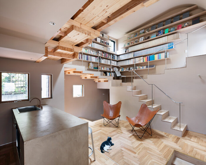 built for cats, tan yamanouchi's japanese home unfolds around a playful spiral staircase