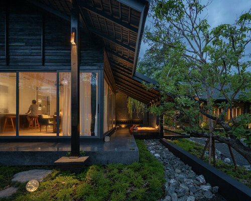 black wooden house in thailand blends contemporary and traditional tectonics