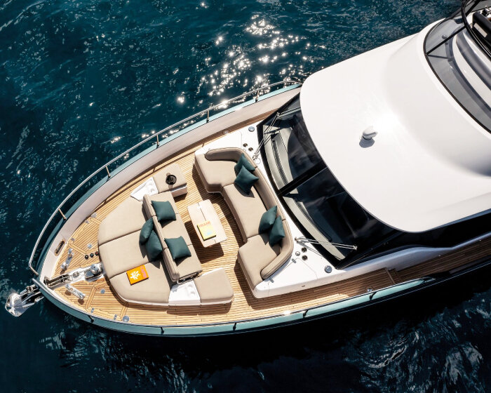 new wave of yacht interiors brings clear sunroofs & open lounges to cannes yachting festival