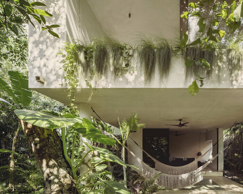 set in tulum, CO-LAB's stilted casa tepui recalls the tabletop mountains of venezuela