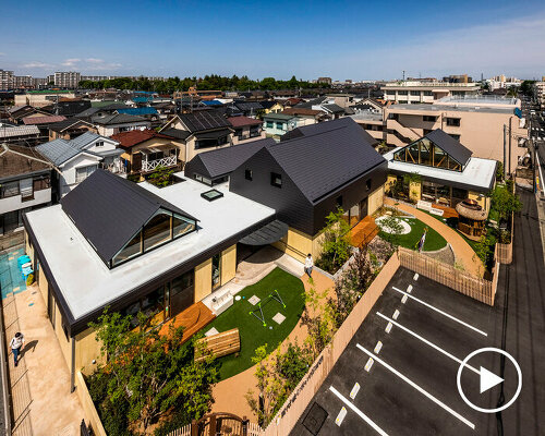 five wooden house-shaped volumes compose himawari nursery school in tokyo