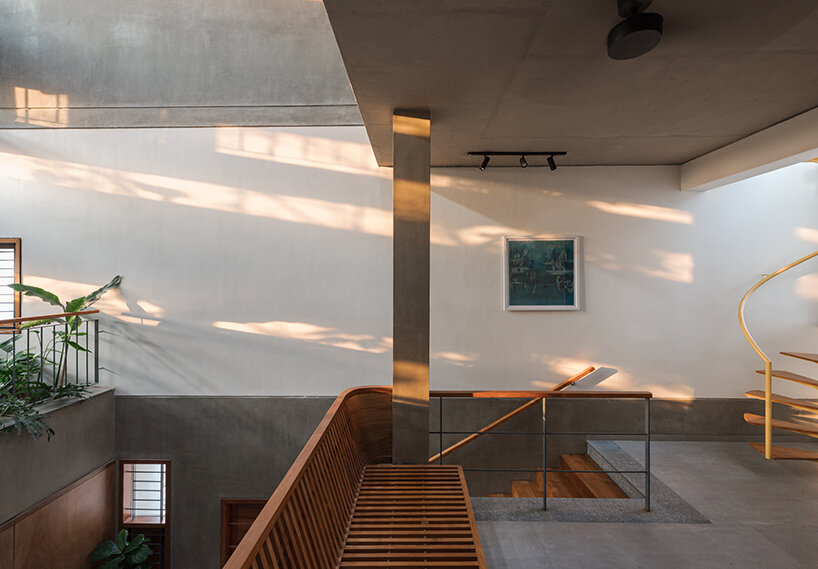 a threshold's green-filled 'ineffable light' house in bangalore