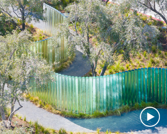 apple park's mirage sculpture takes shape as iridescent glass pillars winding through trees