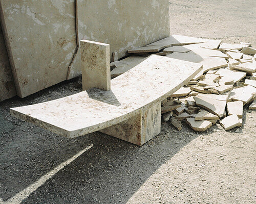 leonardo talarico handcrafts monolithic benches and fountains from tuscan travertine