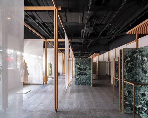 neri&hu weaves green marble, brass & linen screens into Ms MIN's retail space in shanghai