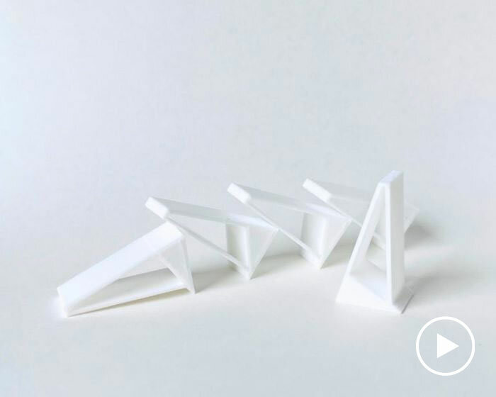 yuichiro morimoto's 3D-printed triangular domino tiles get up instead of falling down