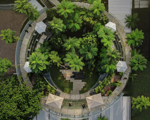 multi-leveled green platforms shape tanatap ring garden café by RAD+ar in jakarta