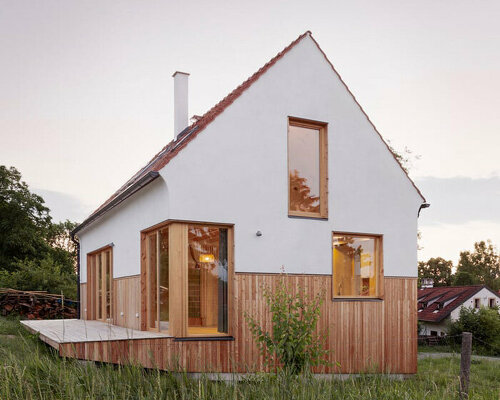 terracotta gable roof tops martin zizka's organic house, echoing czech republic's landscape