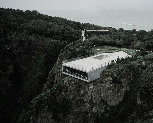 TAO embeds minimalist cliff café and tower house into a rocky island coast