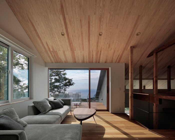 expansive roof tops the remodeled skip-floor structure of old villa in japan