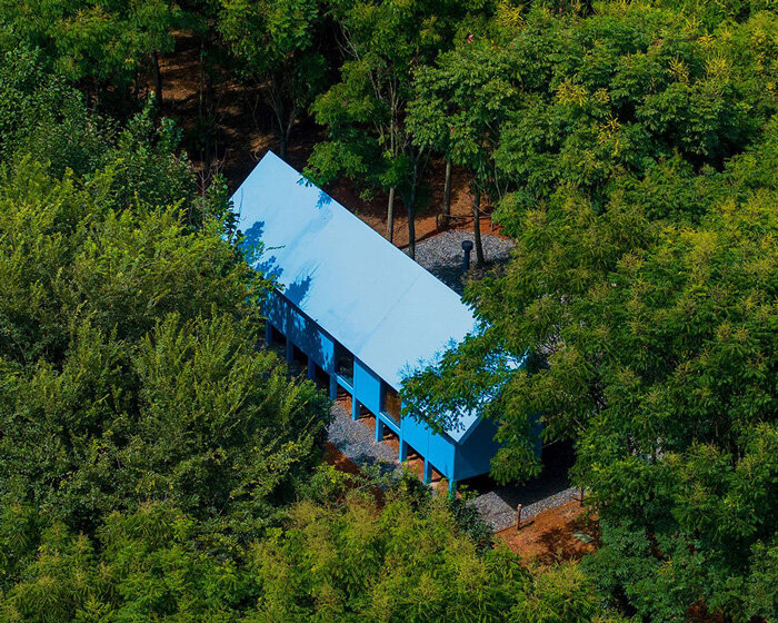 double slope roof tops wiki world's blue wooden cabin engulfed in chinese forest