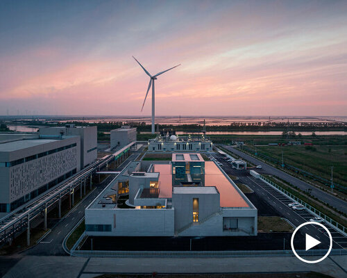 biomanufacturing facility by xing design lies under shallow water ponds in china