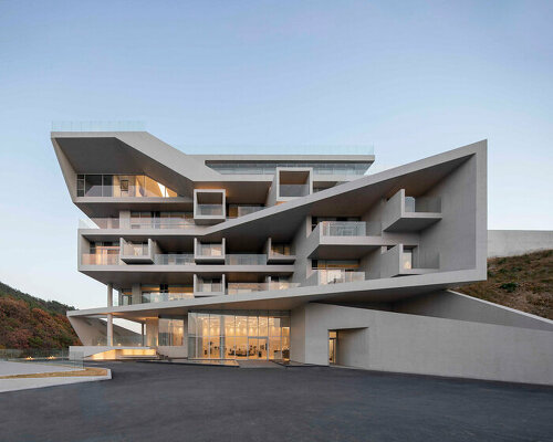 IDMM architects stacks angular concrete volumes to compose immersive hotel in korea