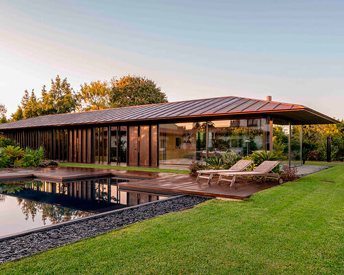 bamboo slats envelop godai pavilion in spain following a gradient pattern