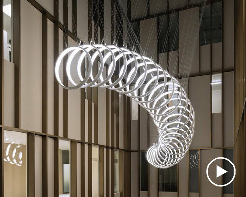 SpY suspends kinetic installation in bern hospital atrium for artistic healing