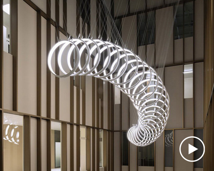 SpY suspends kinetic installation in bern hospital atrium for artistic healing