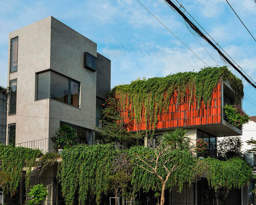 hanging garden grows out of maison k's ceramic tiled facade in vietnam