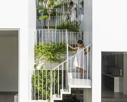 nguyen khai architects infuses its 'nala house' with lush gardens in vietnam