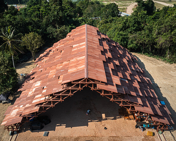 bangkok project studio constructs grand gable roof pavilion for thailand festival